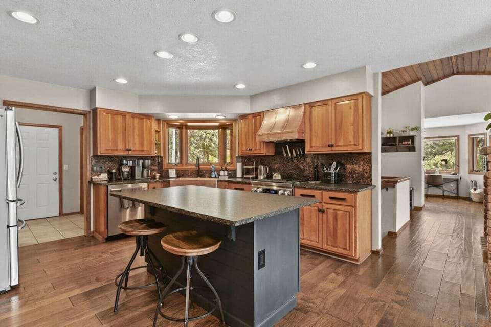 Kitchen has coffee makers, cookware, and large fridge/freezer for extended stays