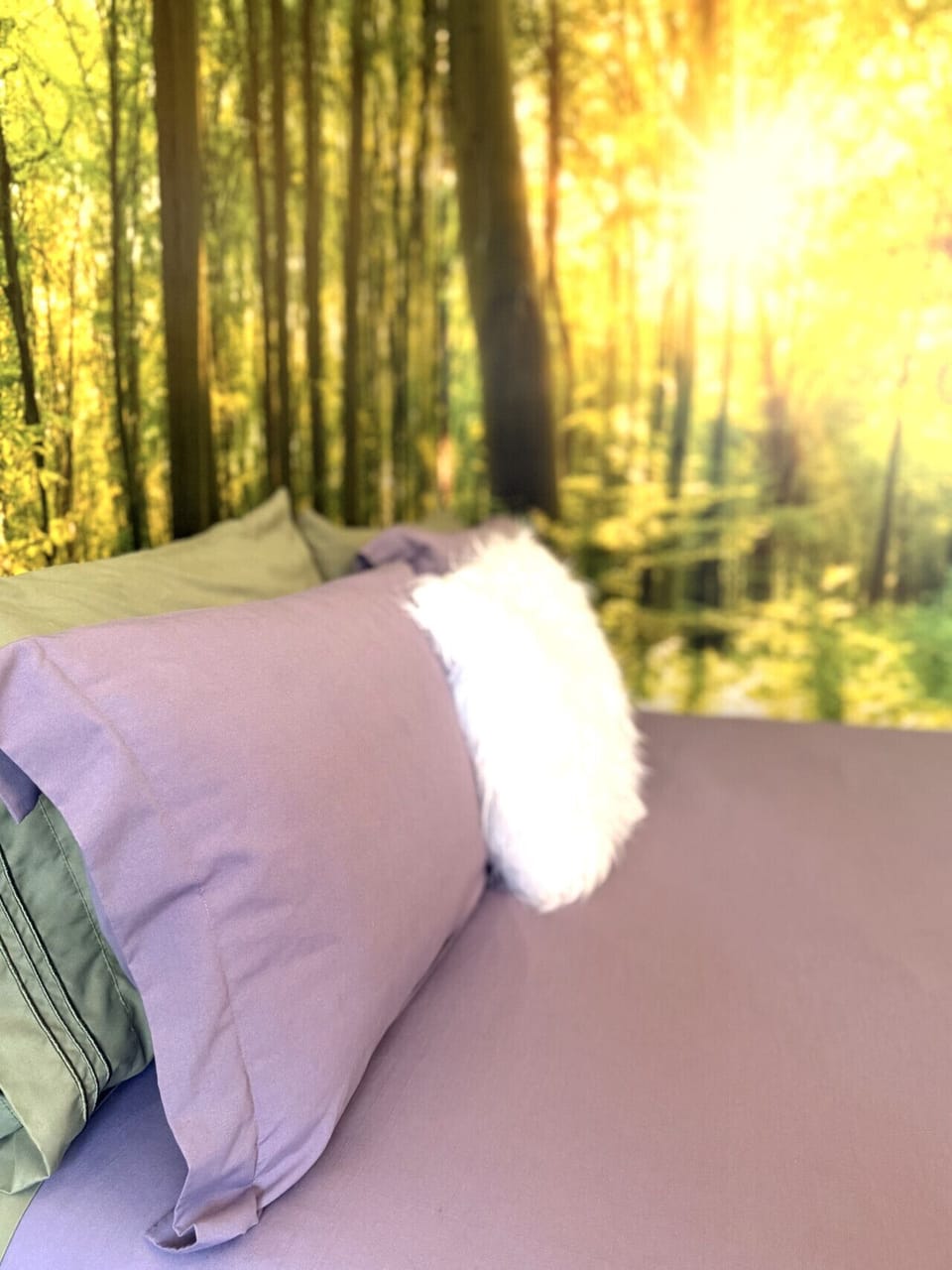 Wake up to peaceful forest-inspired décor, soft textures, and calming Catskills mountain charm.