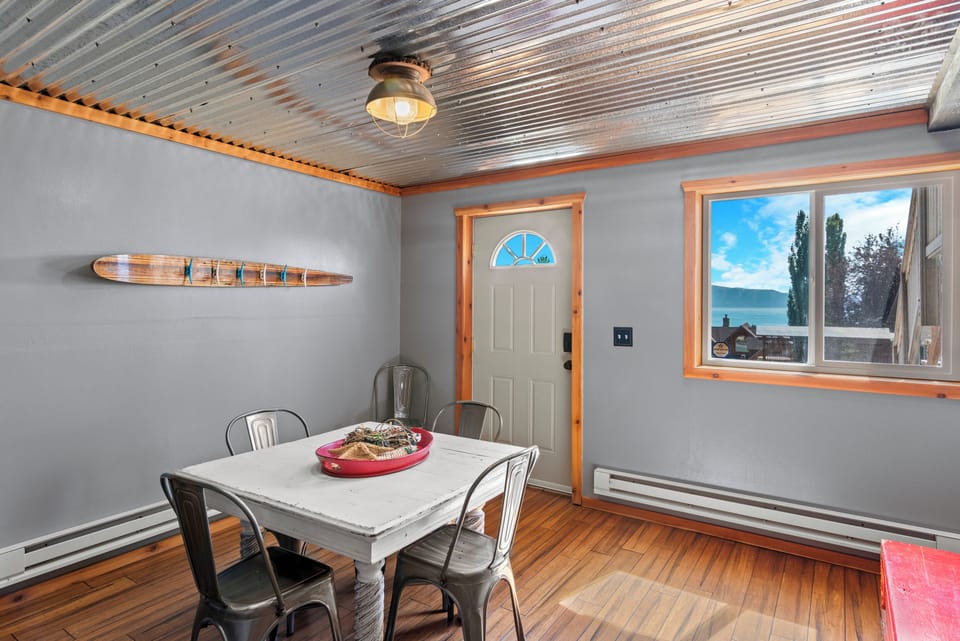As you descend the stairs to the basement, you'll be greeted once again by the stunning views of Bear Lake