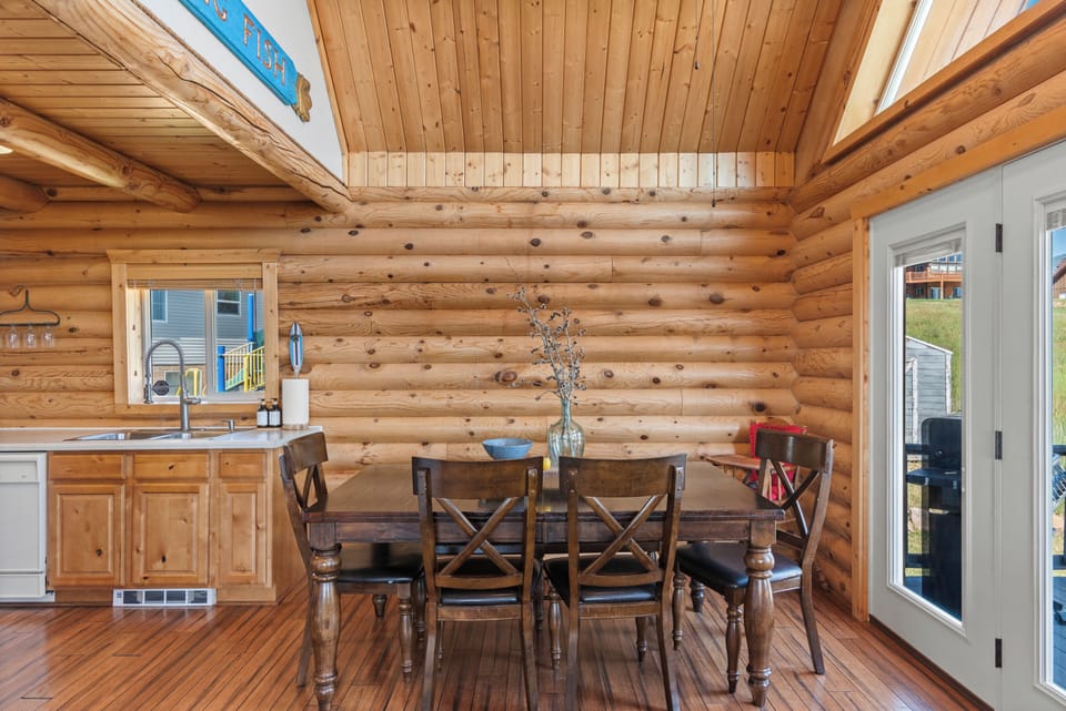 Our open-concept dining space comfortably seats 6 guests, with additional seating available downstairs