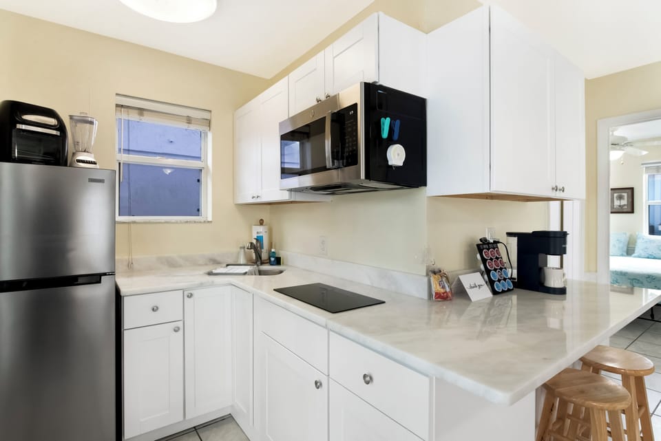 Half Kitchen | Built-In Microwave | Coffee Maker | Compact Layout