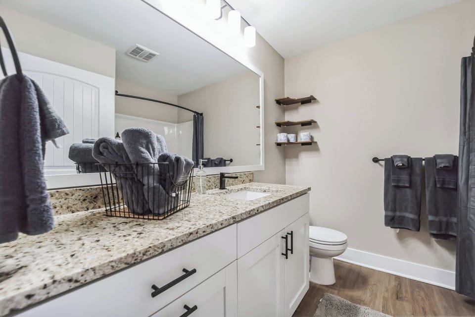 Easy access to the hallway bathroom, just across from the spare bedroom