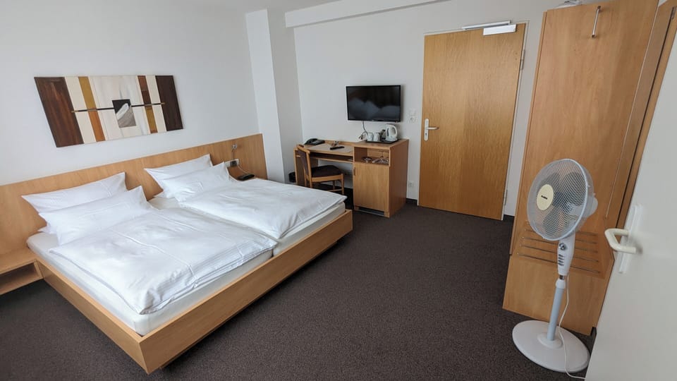 Double Room | Minibar, desk, laptop workspace, blackout drapes