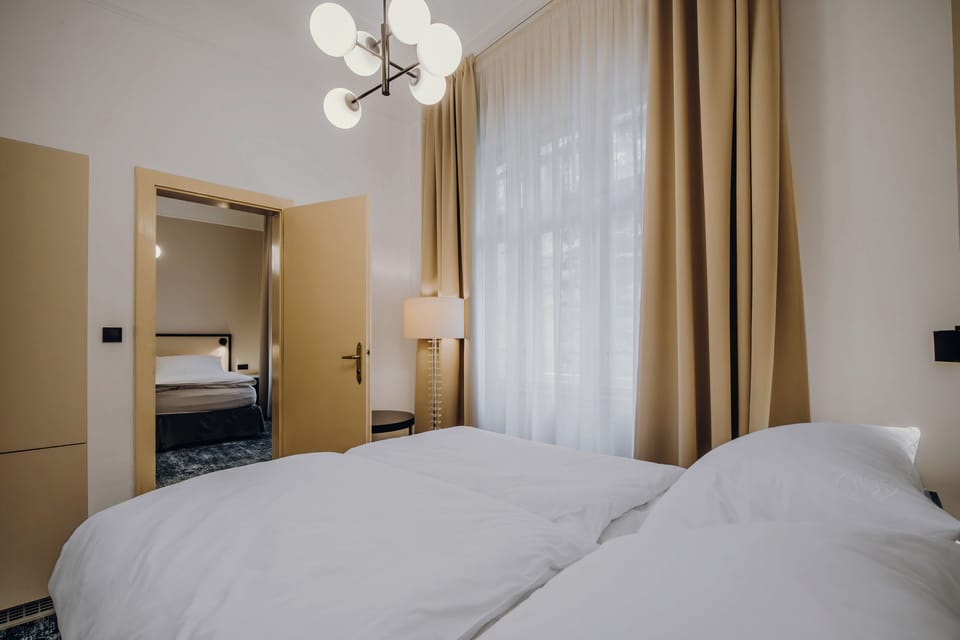Standard Quadruple Room, Non Smoking | Select Comfort beds, in-room safe, laptop workspace, blackout drapes