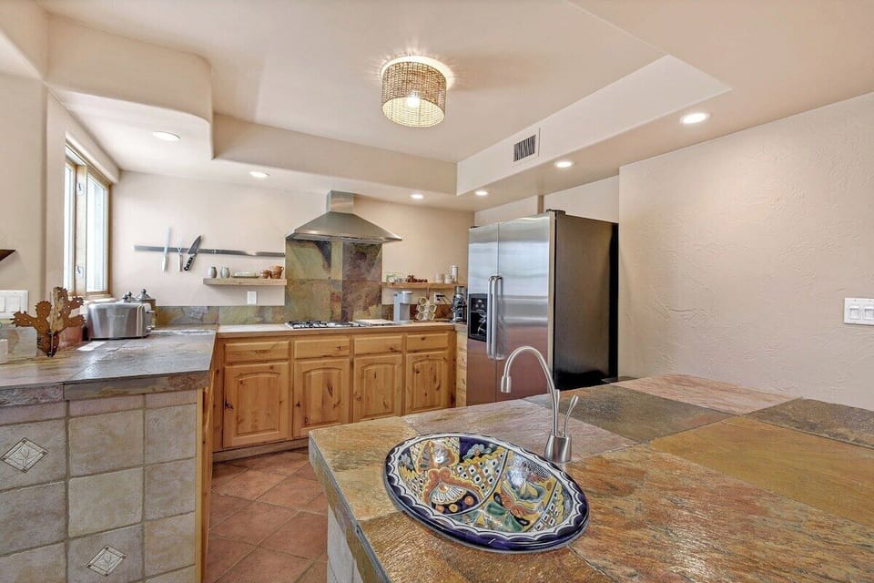 Open kitchen with full ammenities and Island with coffee bar area