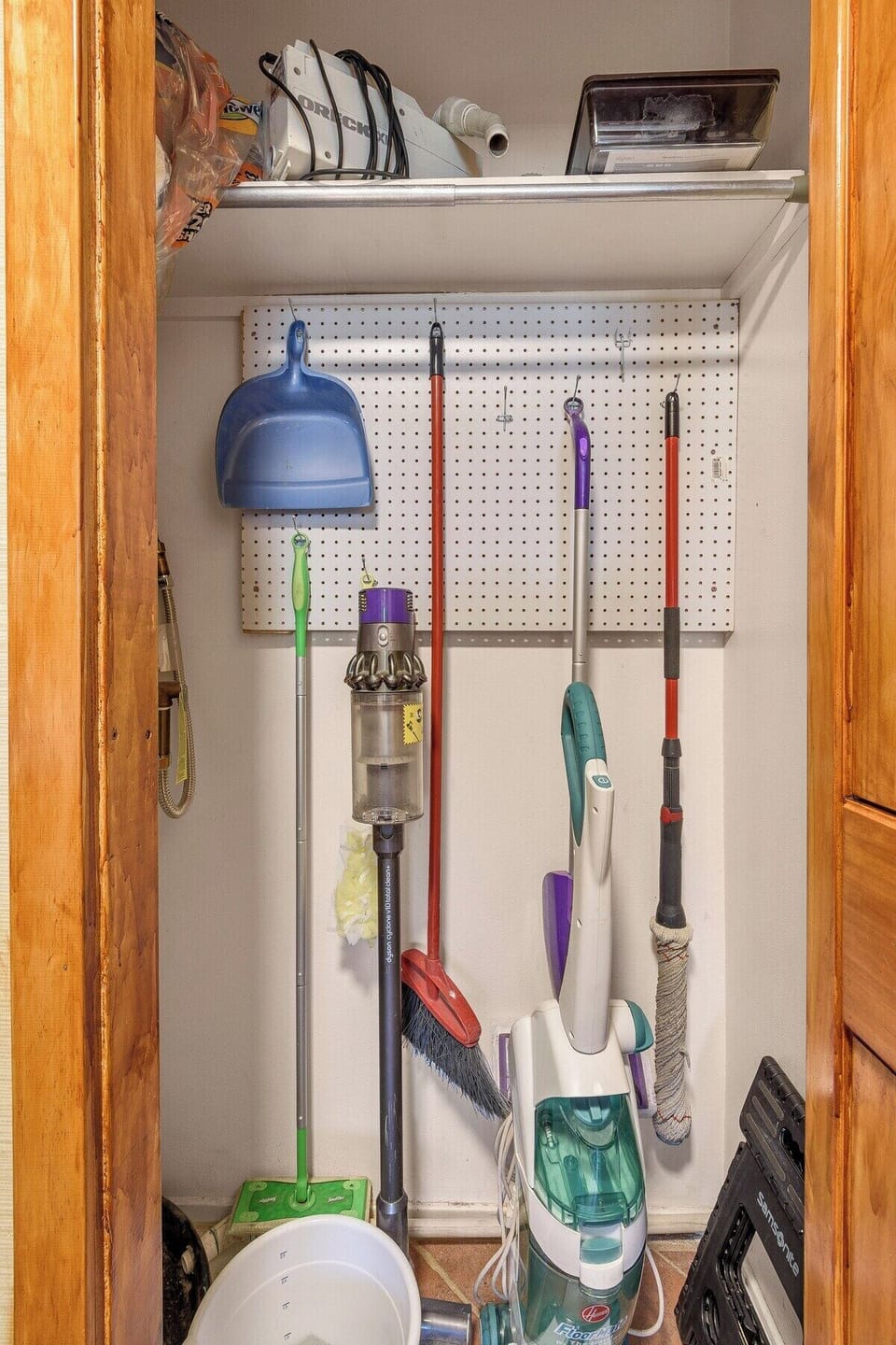 Utility closet in laundry space