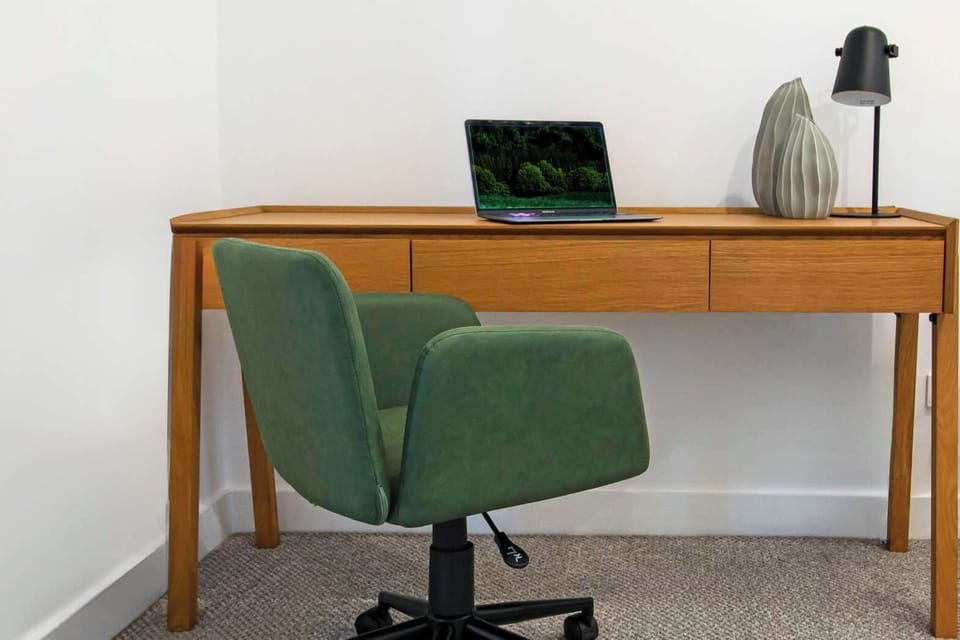 Elevate your workday with a sleek workspace station designed for both comfort and productivity