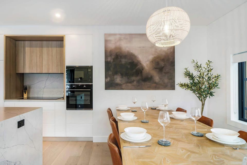 Gather around this spacious dining table with 8 chairs, perfect for sharing meals and creating lasting memories with family and friends