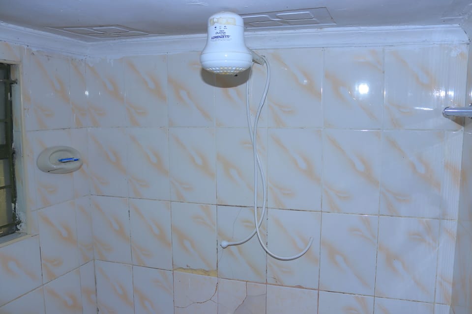Deluxe Quadruple Room, Balcony | Bathroom shower