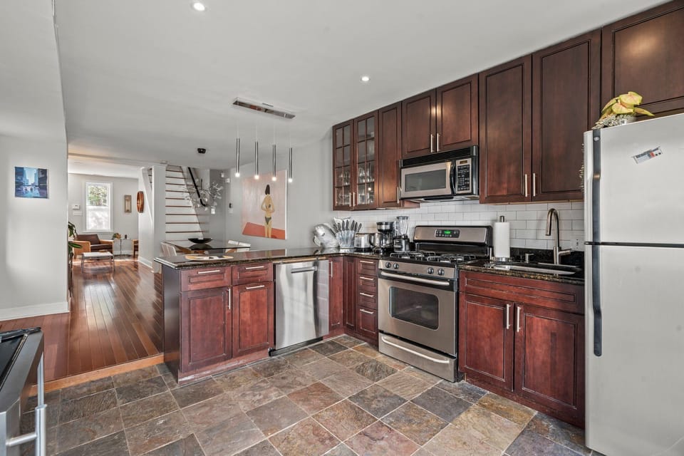 The open-concept kitchen and dining area create a perfect space for entertaining and family meals.