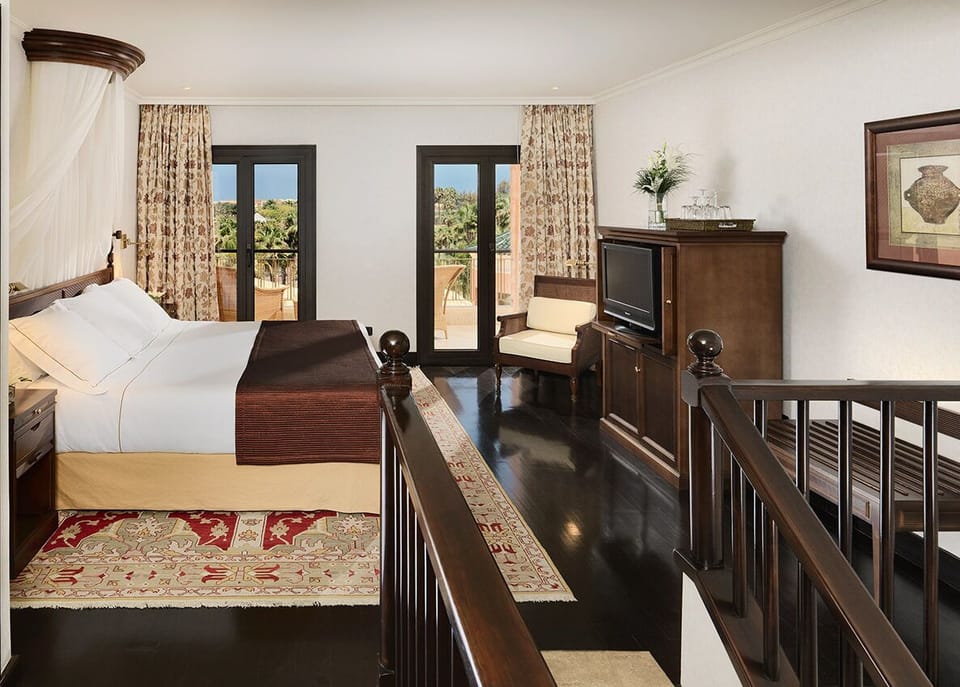 Duplex (Suite ) | Minibar, in-room safe, desk, blackout drapes