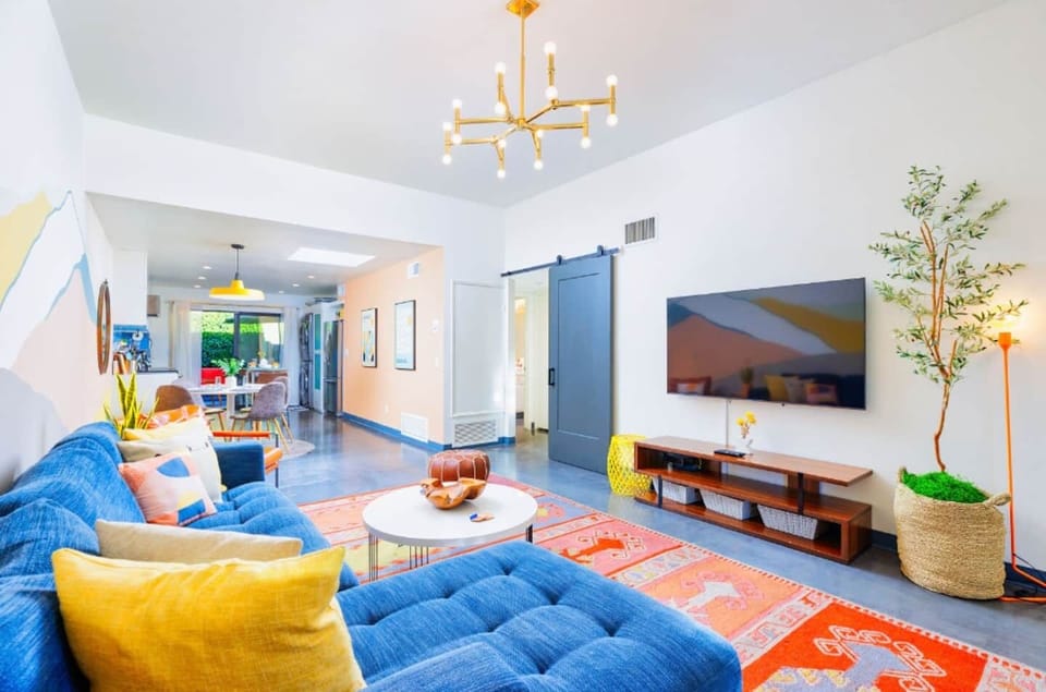 Bright open-concept dining and living space designed for comfort, style, and easy entertaining.