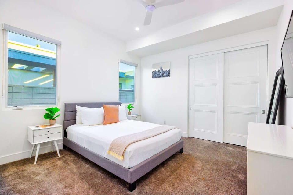 Guest bedroom #3 with a queen bed and smart TV. 