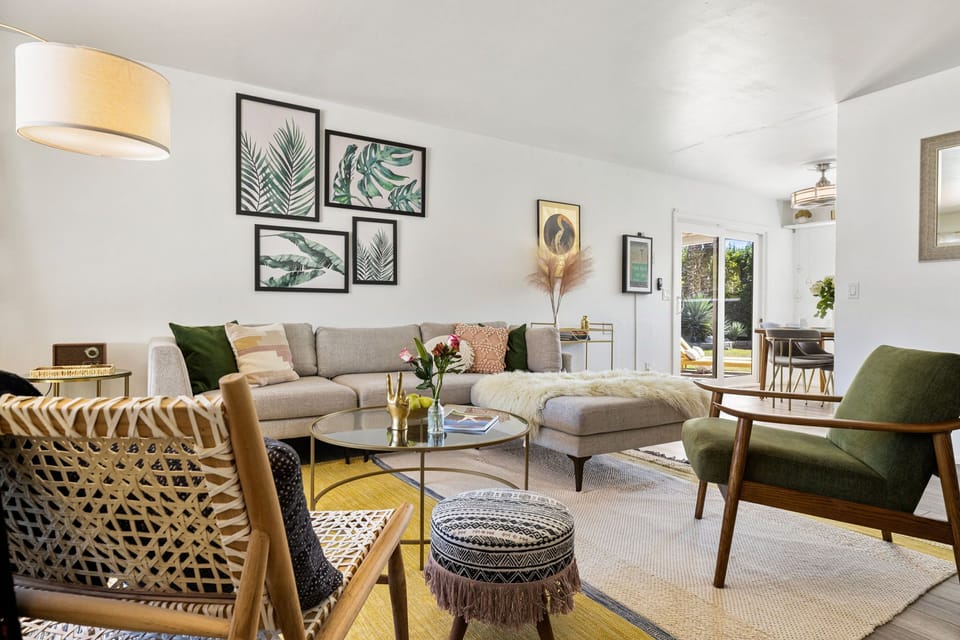 Experience seamless living in this open-concept space, where modern design meets comfort in the living and dining areas