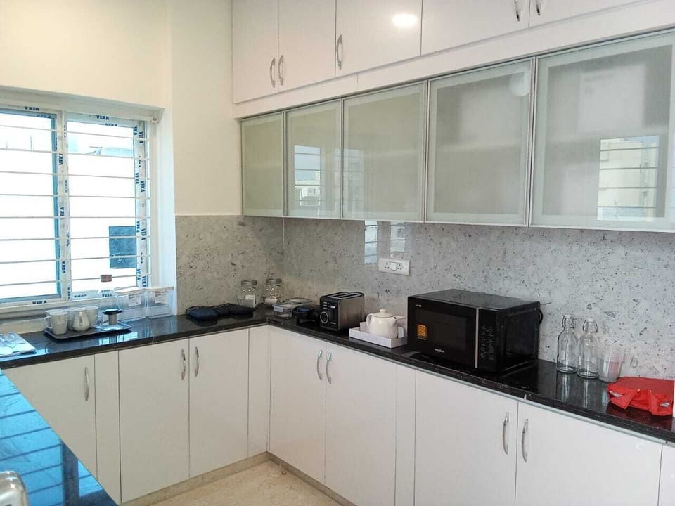 Two Bedroom Apartment | Private kitchen | Fridge, microwave, oven, electric kettle