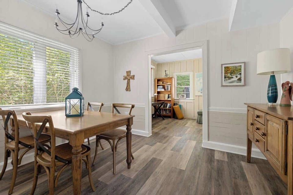 This dining space blends charm and comfort, creating the perfect backdrop for meals that linger long after the last bite.