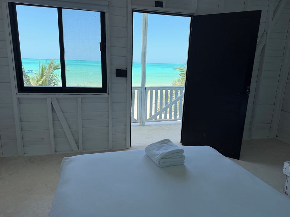 Deluxe Double Room, 2 Double Beds, Beach View | WiFi (free), bed sheets
