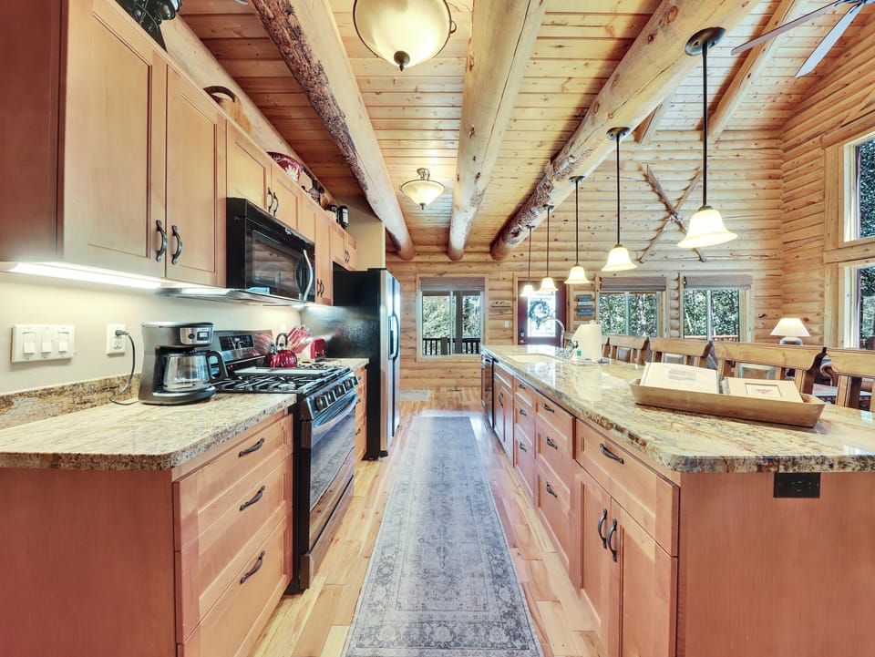 Modern galley kitchen equipped with fully updated appliances and all the essentials for a comfortable stay