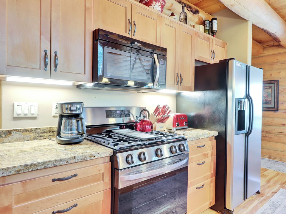 Modern galley kitchen equipped with fully updated appliances and all the essentials for a comfortable stay