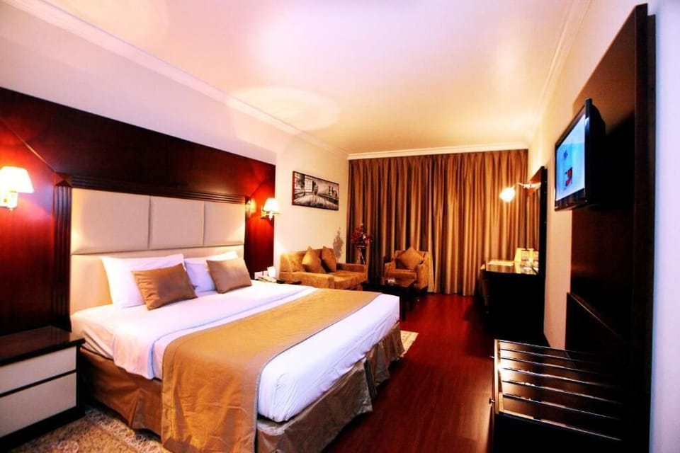 Deluxe Double Room, City View | Minibar, in-room safe, desk, laptop workspace
