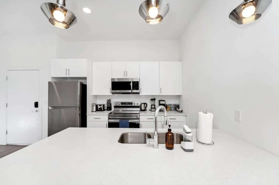 Cook up a storm in the fully equipped kitchen with modern appliances and all the essentials you need.