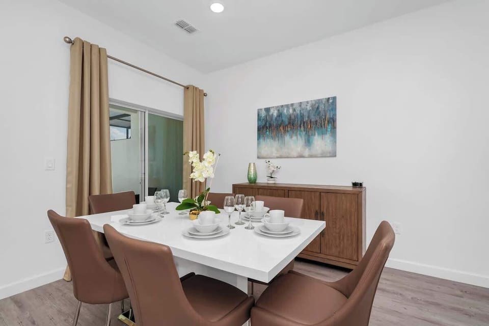 Enjoy meals together in the stylish indoor dining area, perfect for family gatherings.