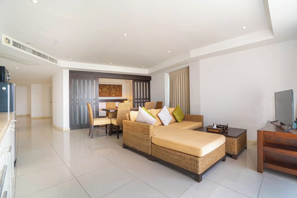 Exclusive Apartment, 2 Bedrooms, Balcony, Partial Ocean View | Living area | Flat-screen TV