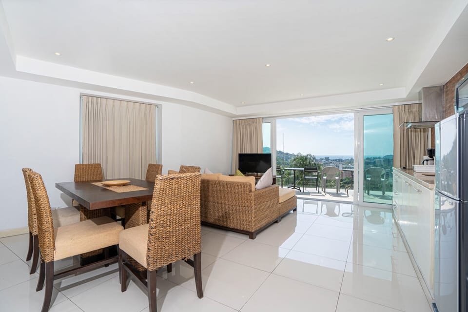 Exclusive Apartment, 2 Bedrooms, Balcony, Partial Ocean View | Living area | Flat-screen TV