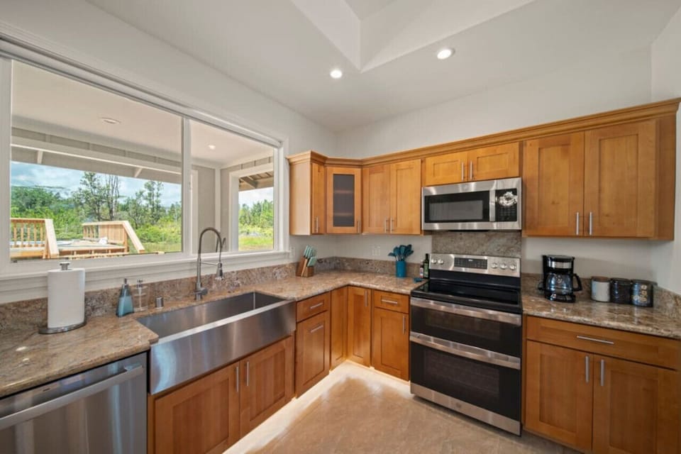 Spacious kitchen with view of the pool