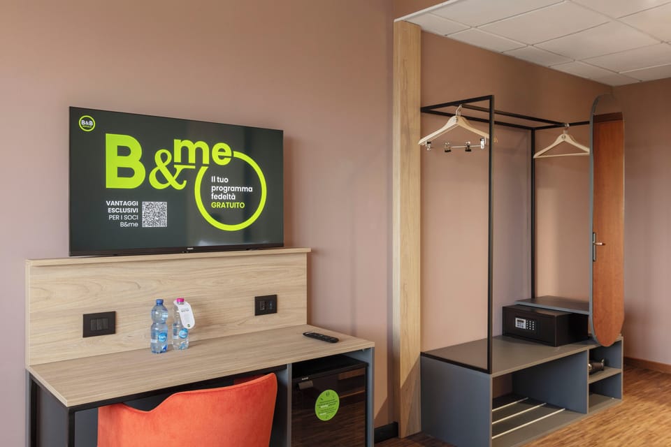 Hypo-allergenic bedding, down comforters, desk, laptop workspace