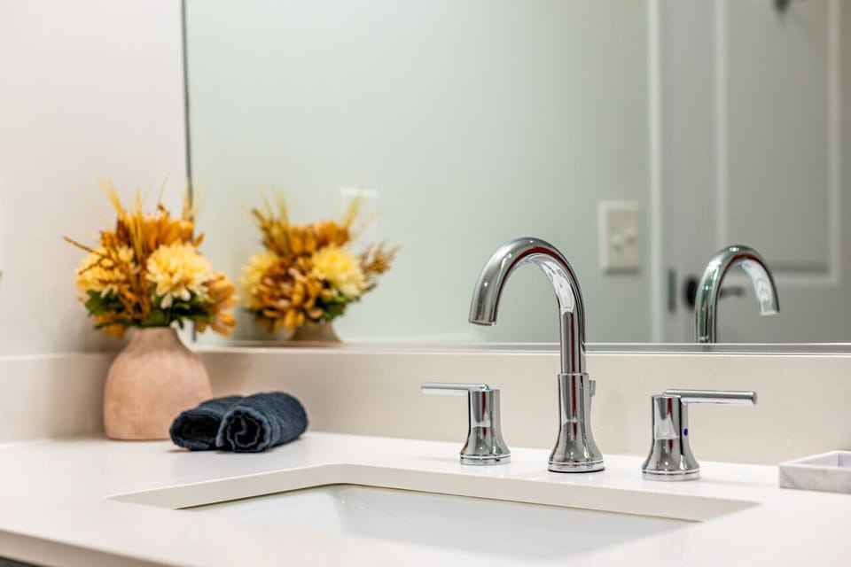 Modern Sink, Make Up Towels, Hand Towels and decorative flowers