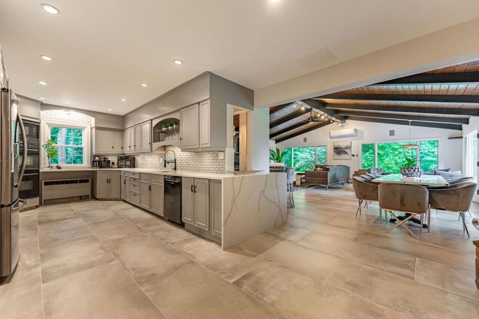 Open kitchen with new Quartz countertops connected to great room