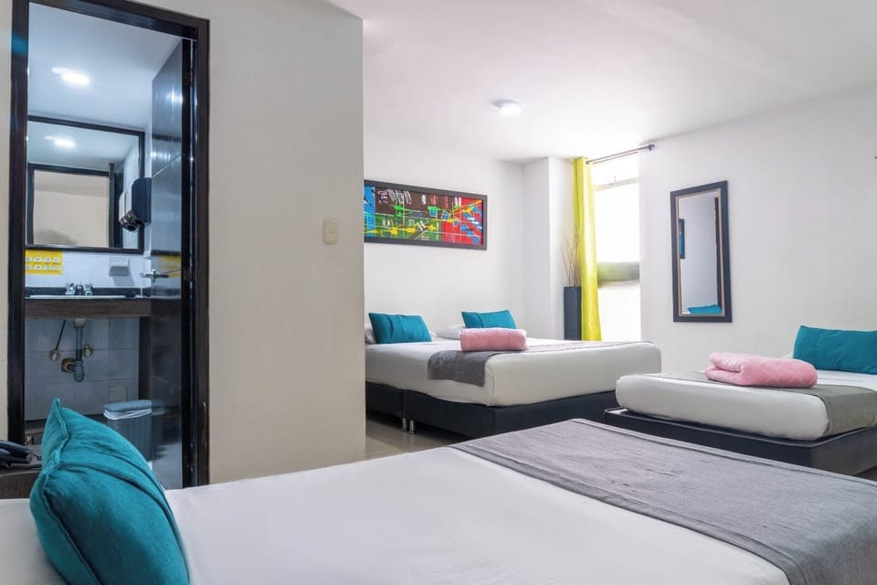 Classic Quadruple Room, City View | In-room safe, desk, iron/ironing board, free WiFi