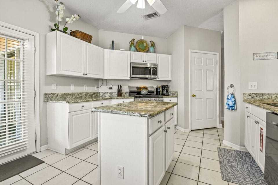 Kitchen with Stainless Appliances & Gas Stove