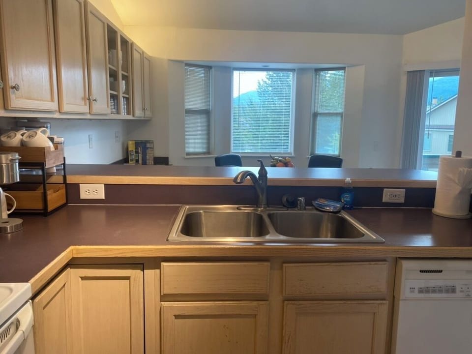 Enjoy a well-arranged kitchen designed for easy meal prep, cleanup, with views!