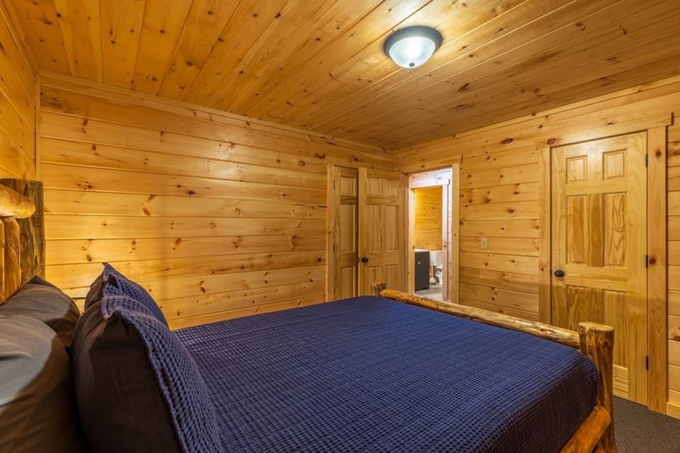 Private Queen Bedroom 1, Lower Level, looking toward Full Bath 1 - Moonlight Ridge Lodge