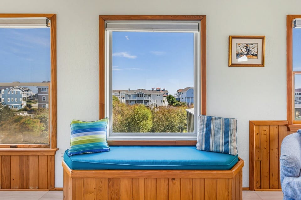 Relax in the spacious Living Area that opens directly onto a Sun Deck with stunning ocean views.