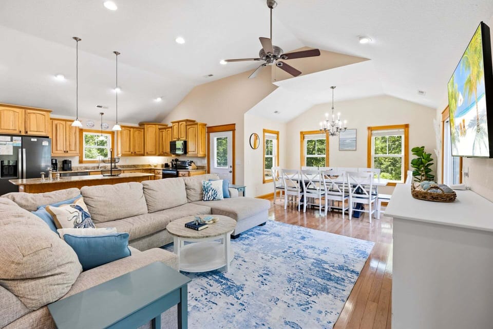The spacious Living Area, complete with a gas fireplace, invites cozy gatherings.