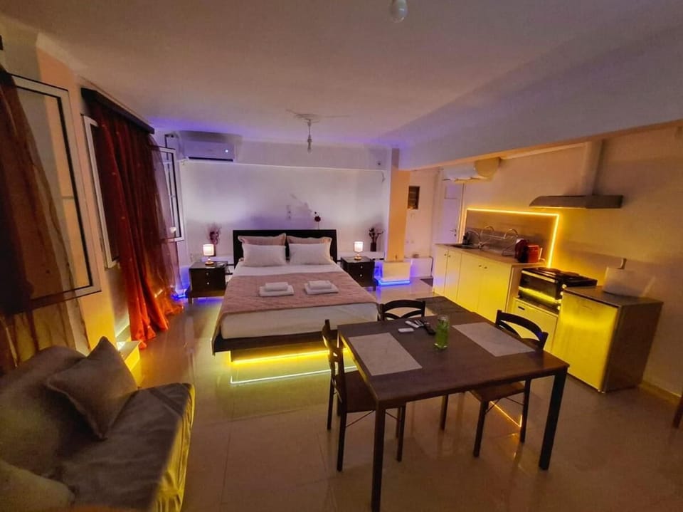 Comfort Studio Suite, Ground Floor | Living area | TV
