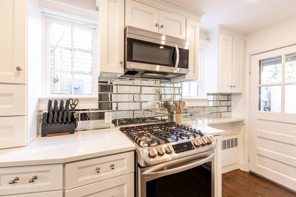 Cook a gourmet meal for your guests over the gas range.