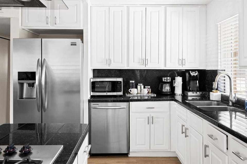 Large fridge and tons of cabinetry
