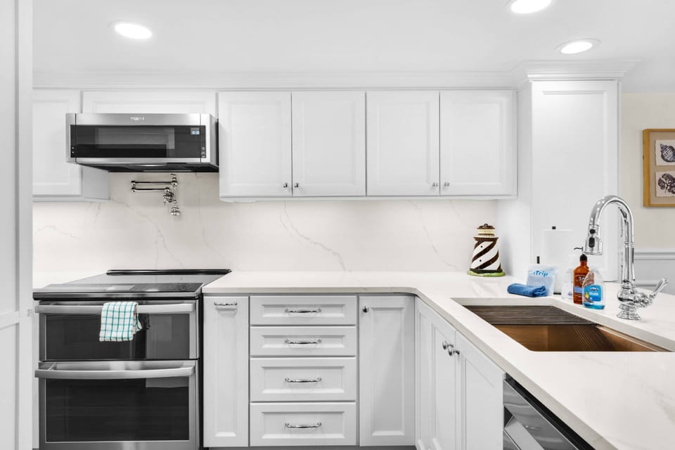 Newly renovated kitchen with double oven and pot filler