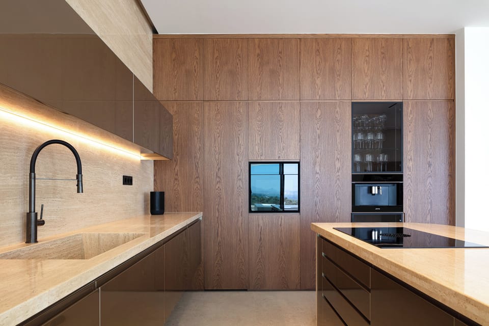 The fully equipped kitchen, with top-of-the-line appliances, makes meal preparation a breeze.