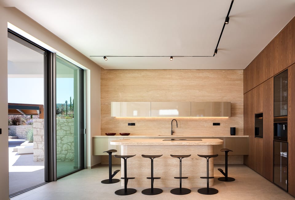 The fully equipped kitchen, with top-of-the-line appliances, makes meal preparation a breeze.