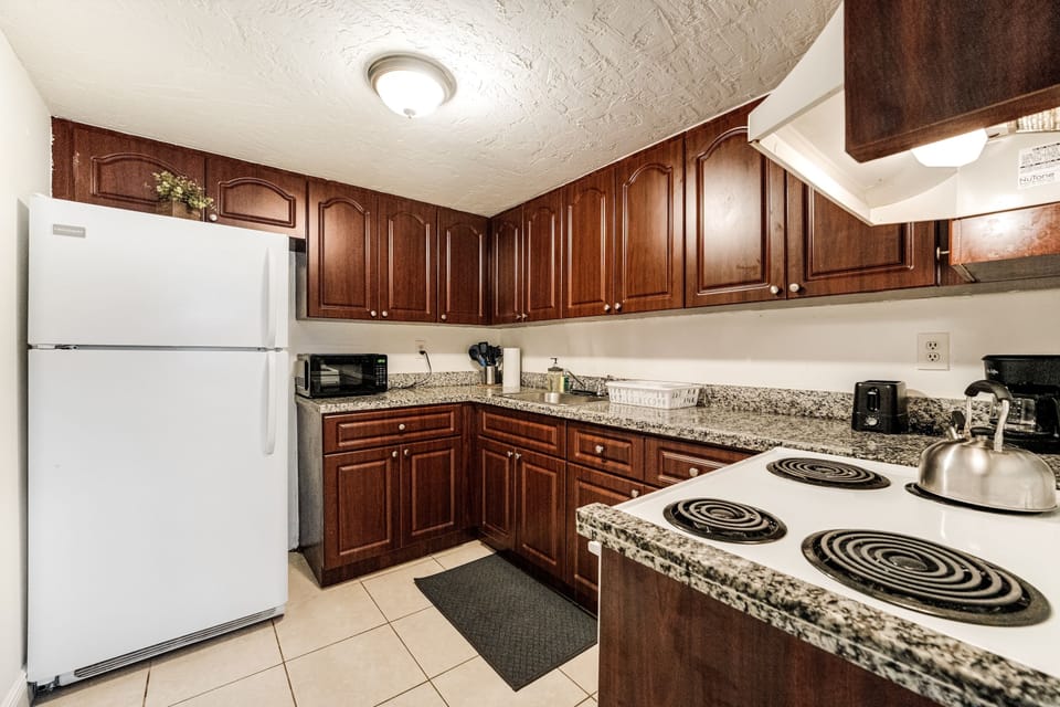 Equipped kitchen with essentials, easy meal preparation and convenience
