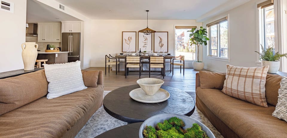 Comfortable living room flowing into the dining area.