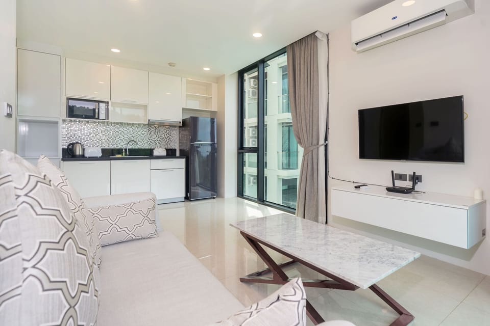 Exclusive Apartment, 1 Bedroom, Balcony, Resort View | Living area | Flat-screen TV