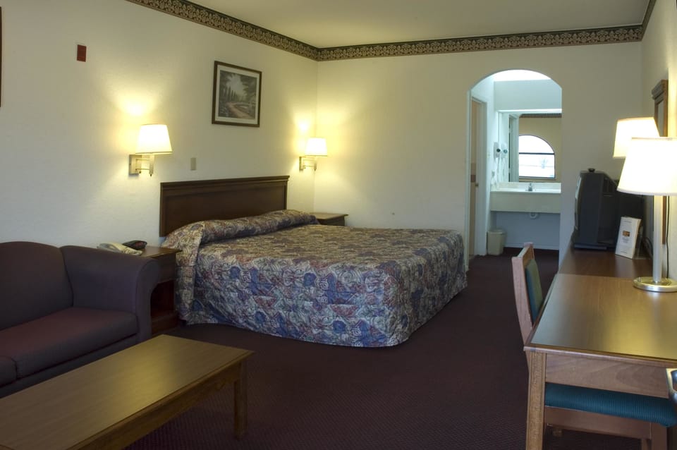 Standard Room, 1 King Bed | Iron/ironing board, free rollaway beds, bed sheets