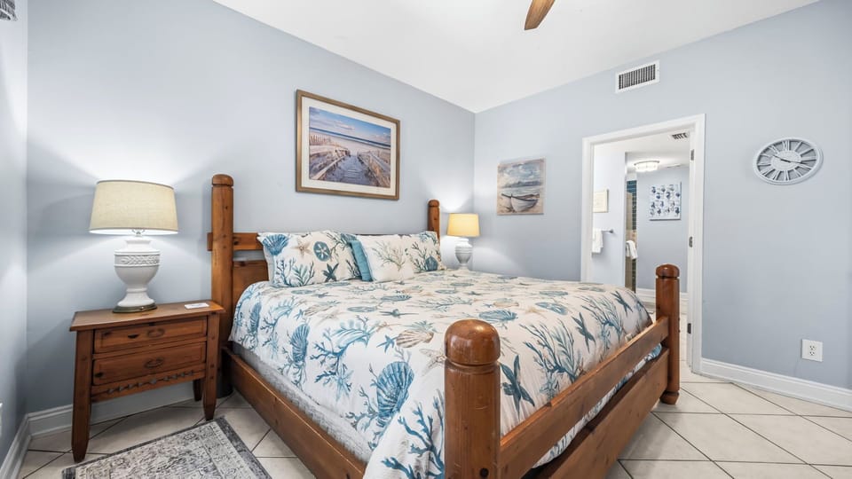 Fernhill by the Sea - - 2nd bedroom with a king bed, TV, and private bathroom with a walk-in shower.