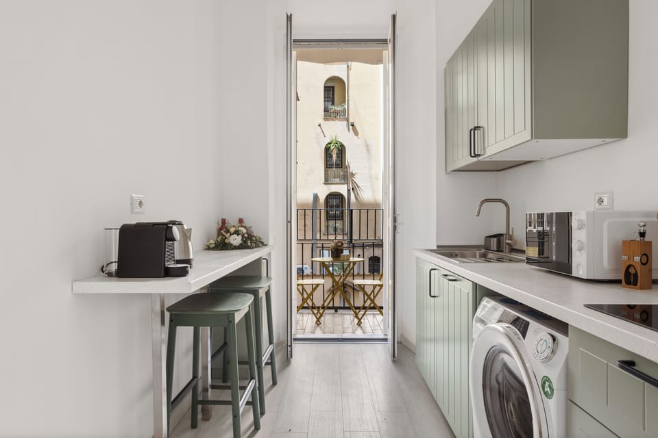 Cucina con uscita sul balcone